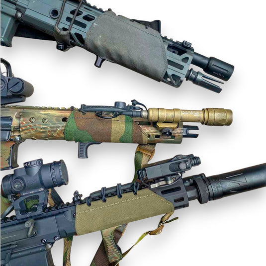Three rifles with different designs and RAIL  WRAP on a white background